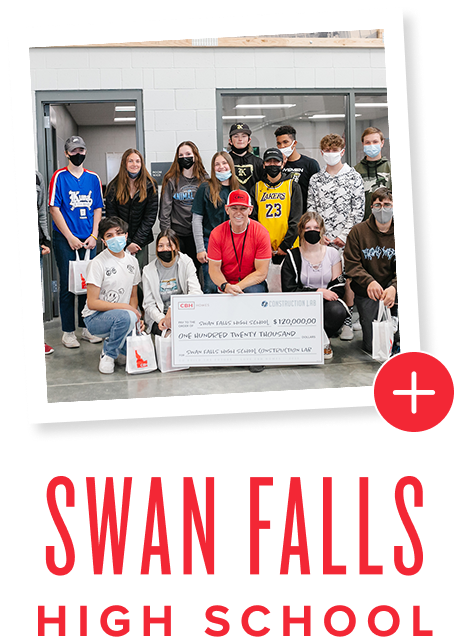 Swan Falls High School - High school class posing with large check