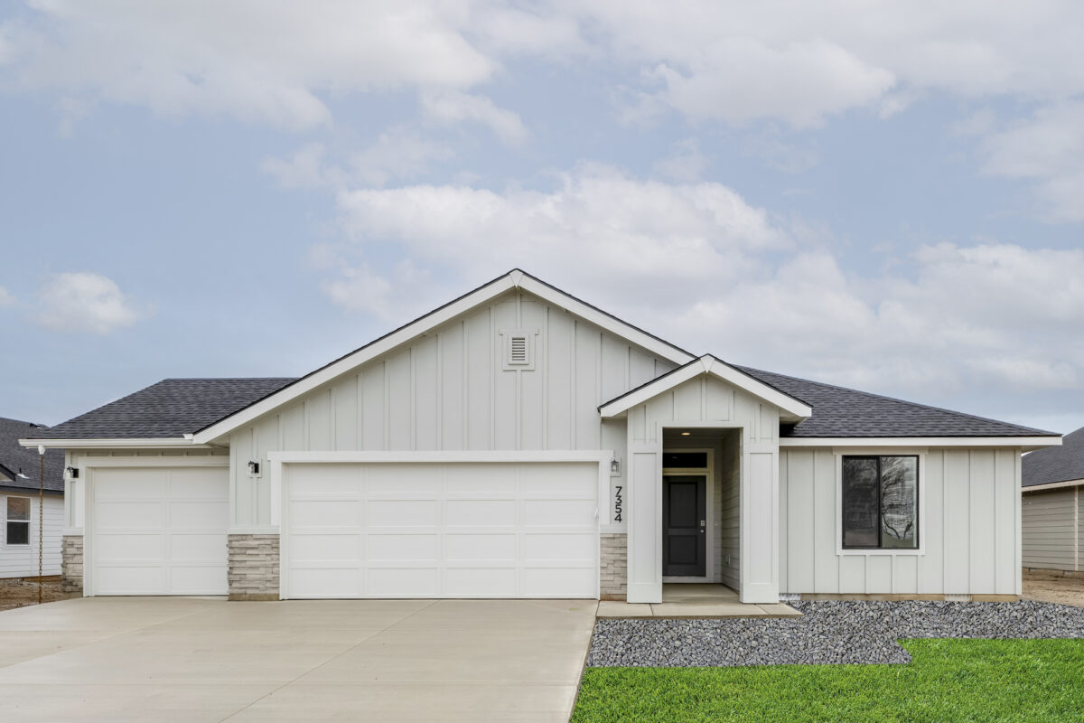New CBH Homes build showcasing modern farmhouse design with durable board and batten siding, a spacious three-car garage, and a welcoming covered entry. This stylish and functional home is part of a vibrant CBH community, designed for comfort and efficiency.